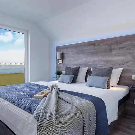 Holiday home Kapitaen Cook By Seeblick Ferien Oro, Wasserbett, E-ladesaeule, *